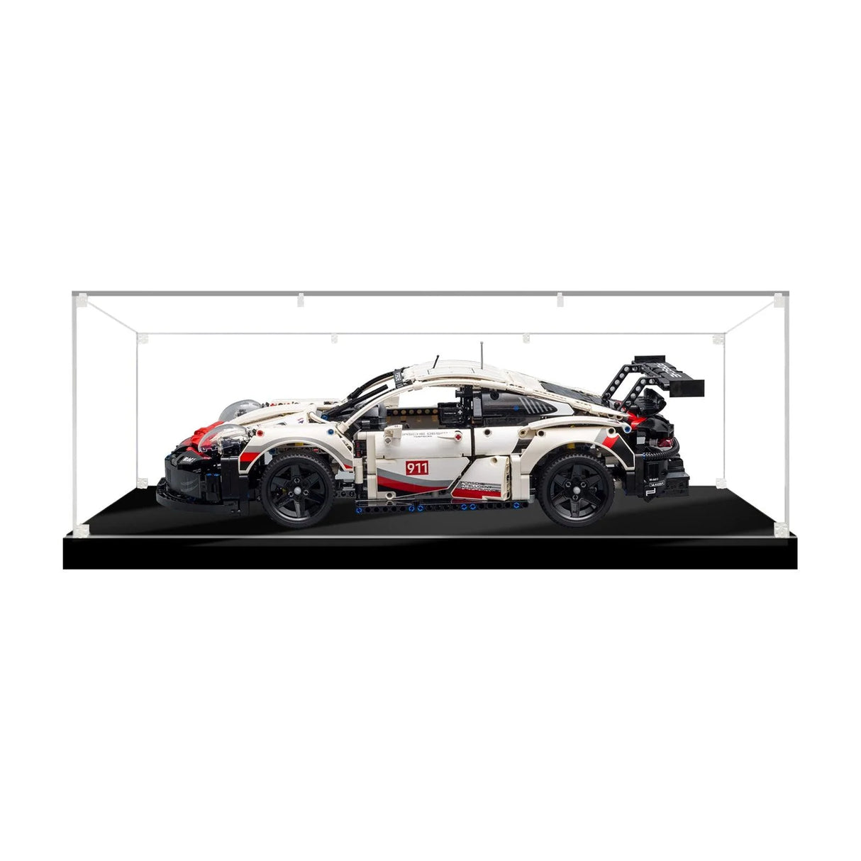 Weißes Porsche 911 Technic Modellauto in einer transparenten Vitrine mit schwarzem Boden