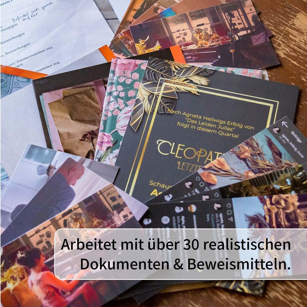 Eine Sammlung von Dokumenten und Fotos, die auf einem Holztisch ausgebreitet sind
