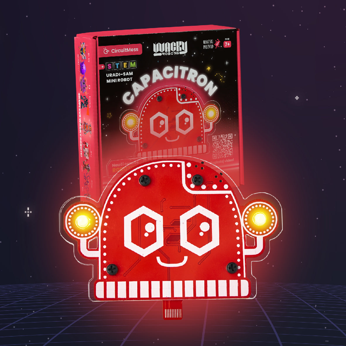 Roter CircuitMess Capacitron Roboter Bausatz mit leuchtenden Augen vor der Produktverpackung
