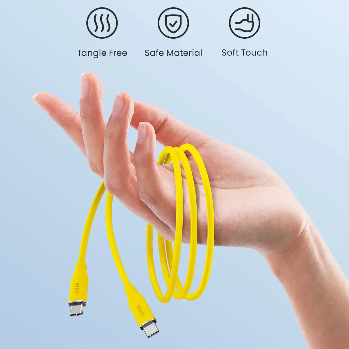 Eine Hand hält ein gelbes, verwicklungsfreies USB-C-Kabel mit weicher Haptik