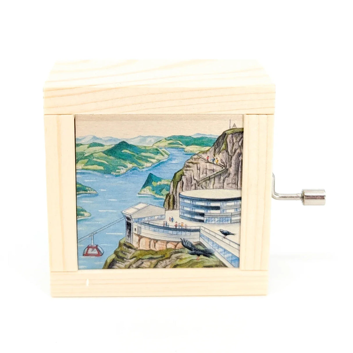 Holzspieldose mit Illustration einer Bergstation und Seilbahn über einem See