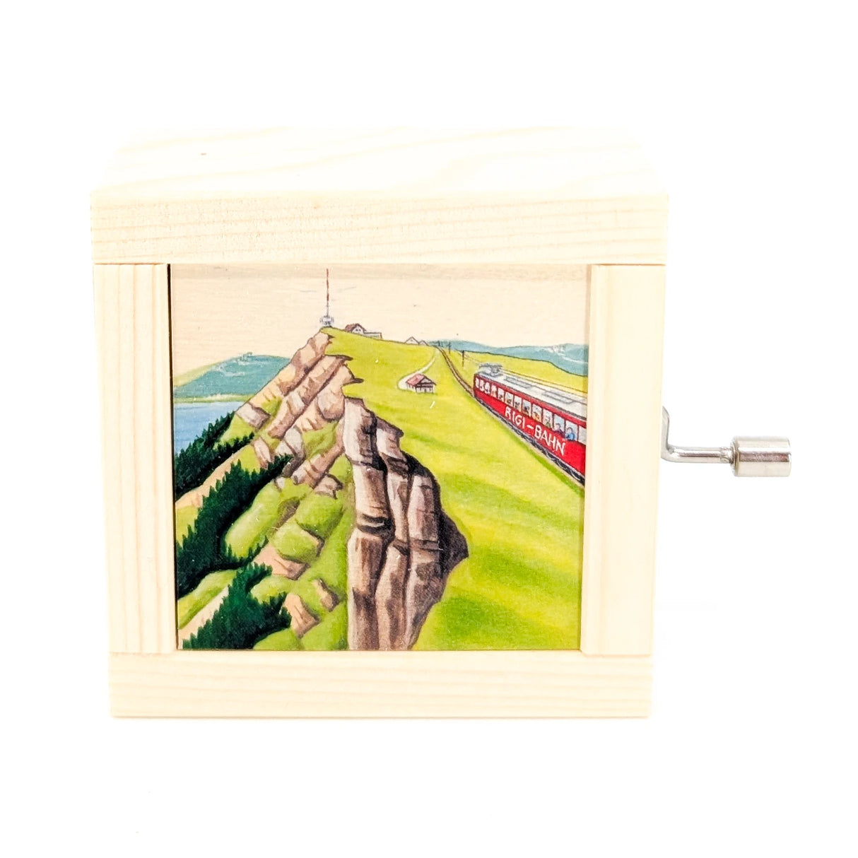 Holzspieluhr mit Bild einer roten Rigi-Bahn auf einem grünen Berg mit See