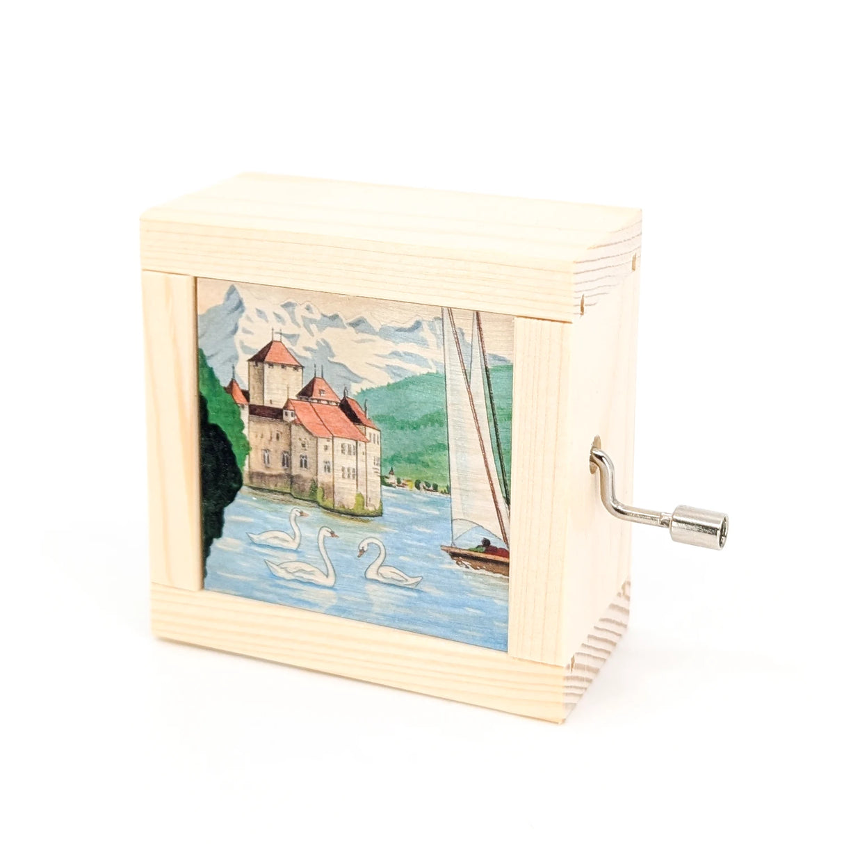 Spieluhr aus hellem Holz mit einer Illustration von Schloss Chillon und Schwänen auf dem Genfersee
