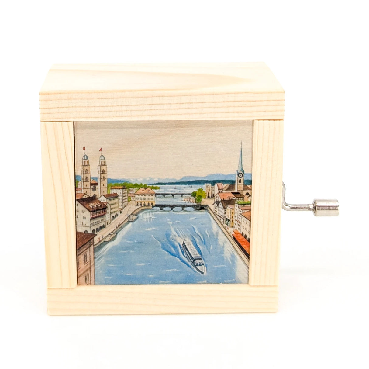 Spieluhr aus Holz mit aufgedruckter Ansicht der Zürcher Altstadt und Limmat