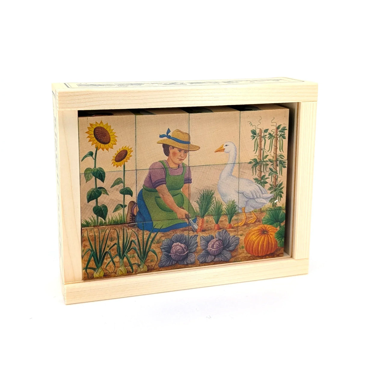Holzpuzzle mit einer Gärtnerin, die Gemüse anbaut, umgeben von Sonnenblumen und einer Gans