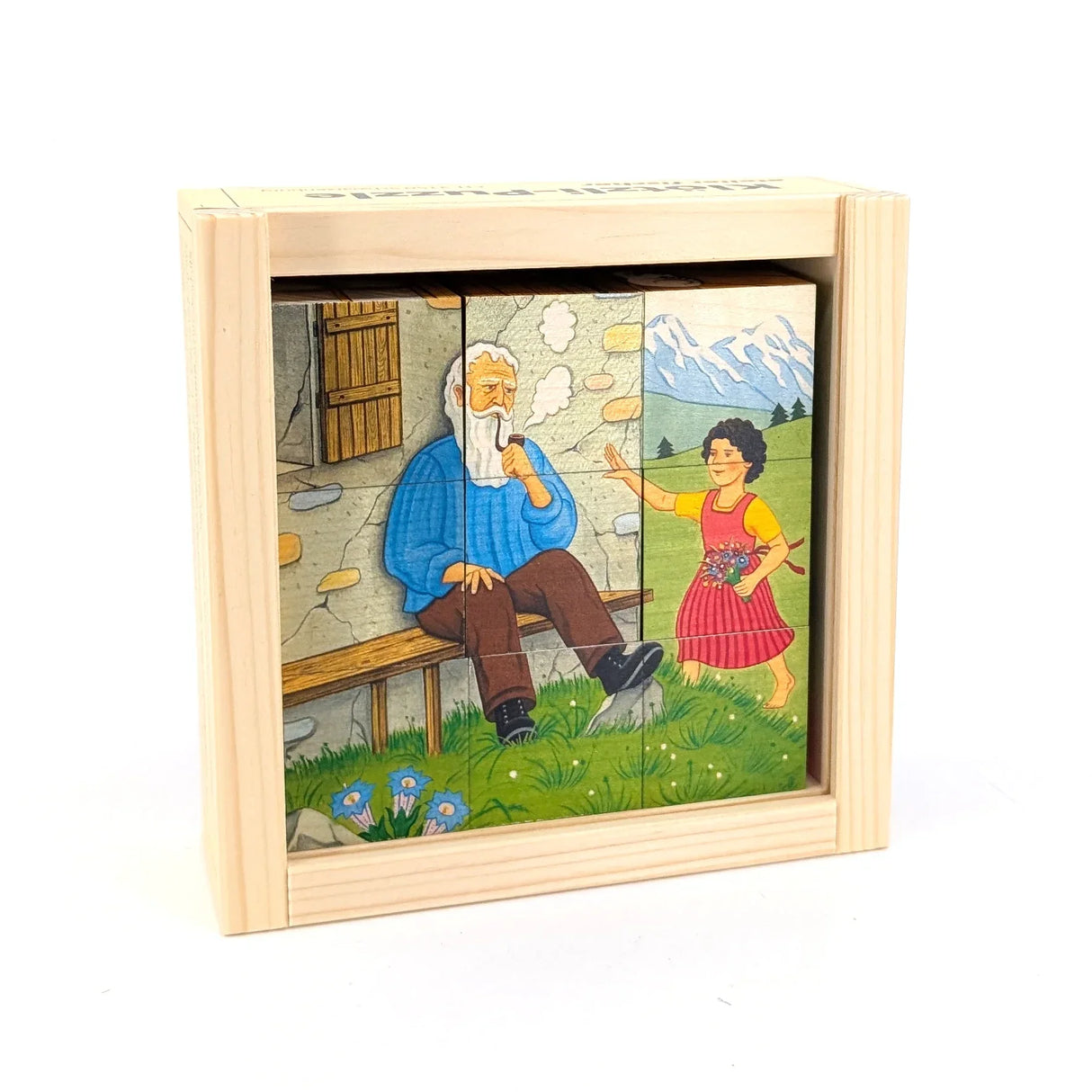 Heidi-Würfelpuzzle mit Großvater und Heidi vor einer Berghütte
