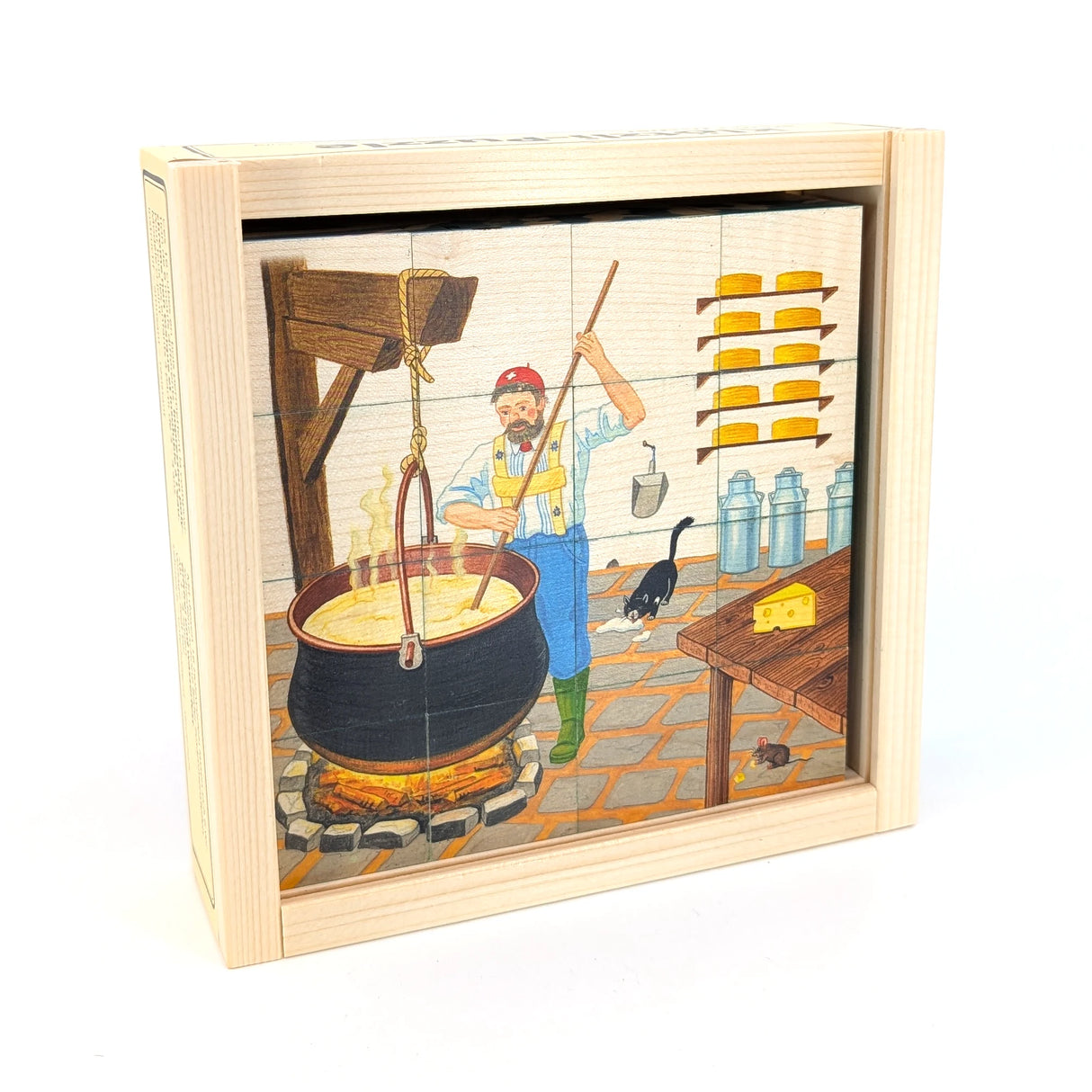 Holzpuzzle mit einem Mann, der Käse in einem großen Topf über dem Feuer zubereitet, mit einer Katze und einer Maus