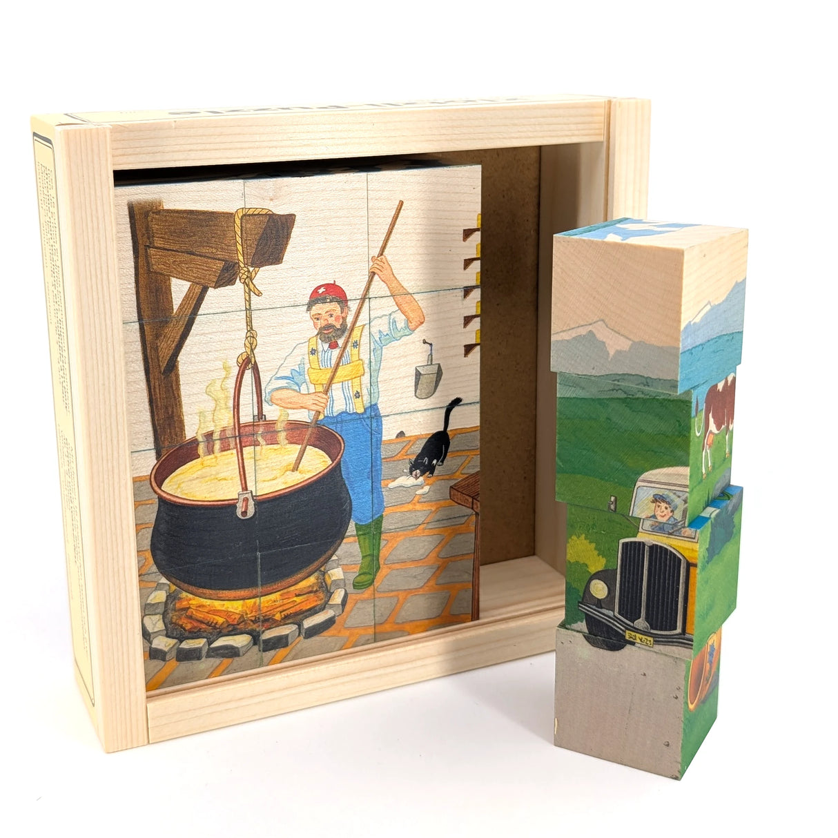 Holzpuzzle mit einem Mann, der Käse in einem Kessel rührt, und einem Stapel Würfel mit verschiedenen Bildern