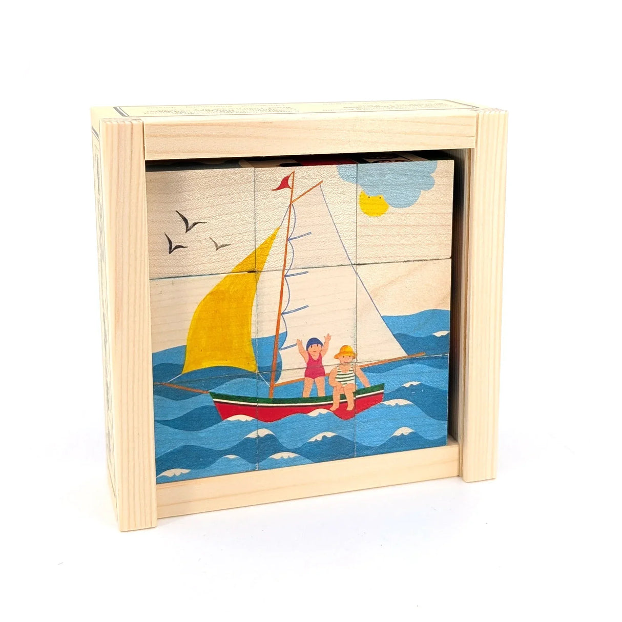 Holzpuzzle mit Segelboot, zwei Kindern, Möwen, Sonne und Wolke