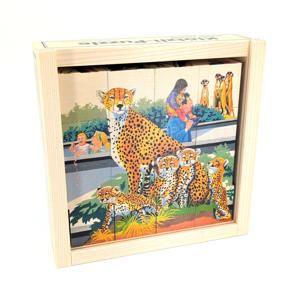 Holzkasten mit einem Puzzle das Geparden, Erdmännchen und Menschen im Zoo zeigt