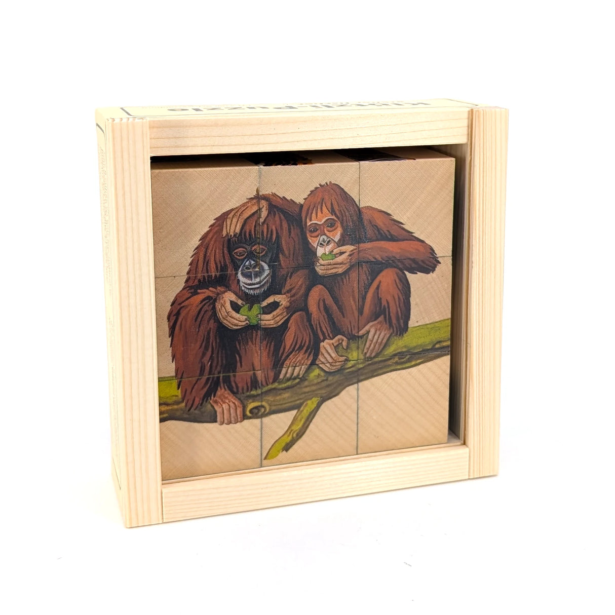 Holzpuzzle mit zwei Orang-Utans auf einem Ast, die Blätter essen