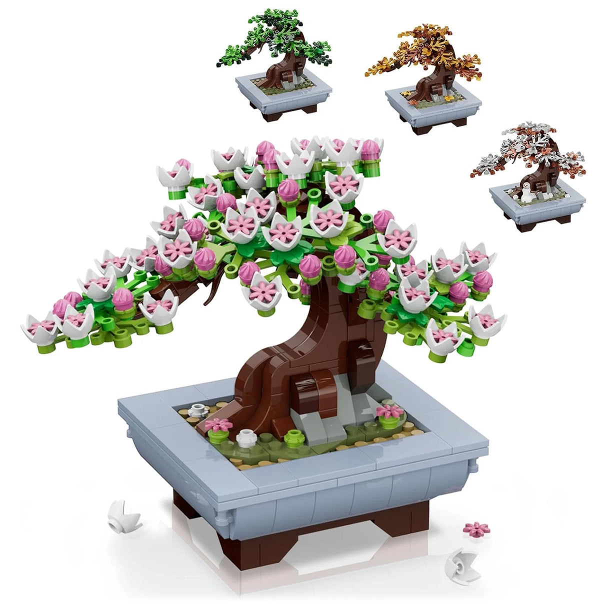 Ein Bonsai-Baum aus Bausteinen mit rosa und weißen Blüten, umgeben von drei weiteren Bonsai-Bäumen