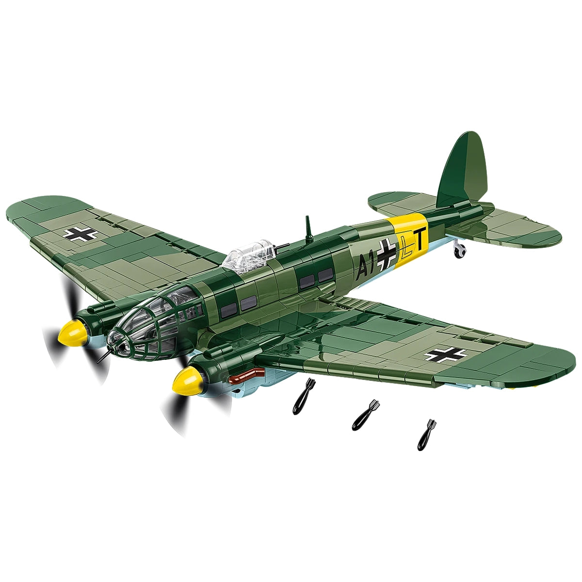 Modell eines grünen Bombers mit gelben Propellern und schwarzen Bomben