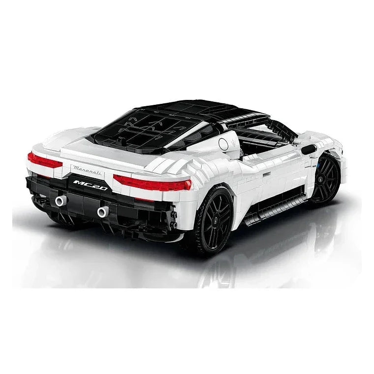 Weißes Maserati MC20 Spielzeugauto mit schwarzen Rädern und Dach