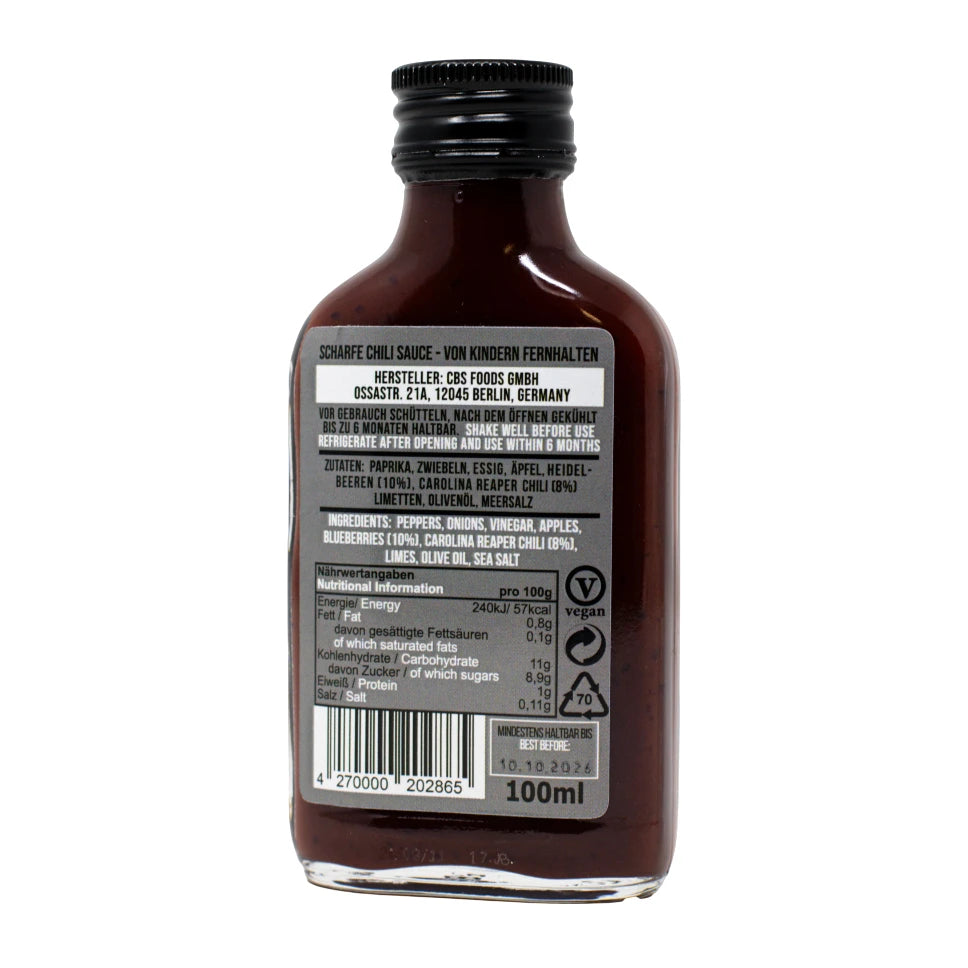 Rückseite einer Flasche scharfer Chilisauce mit Zutaten und Nährwertangaben