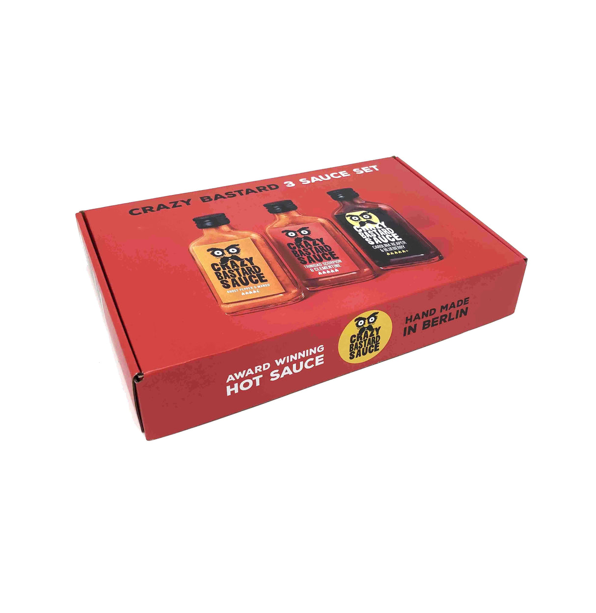 Rote Geschenkbox mit drei verschiedenen Crazy Bastard Hot Sauce Flaschen