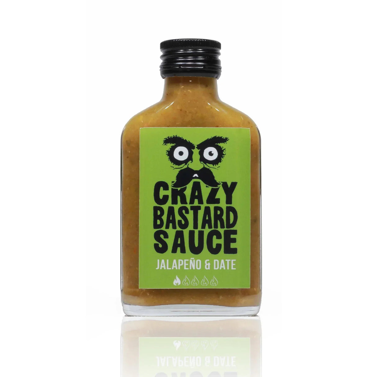 Kleine Glasflasche mit gelblicher Jalapeno und Dattel Soße und grünem Etikett