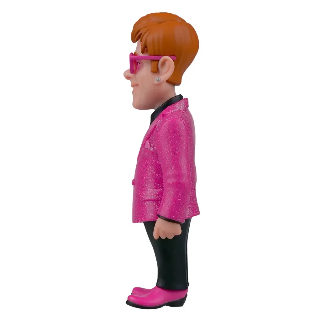 Elton John Figur in pinkem Glitzeranzug und pinker Brille