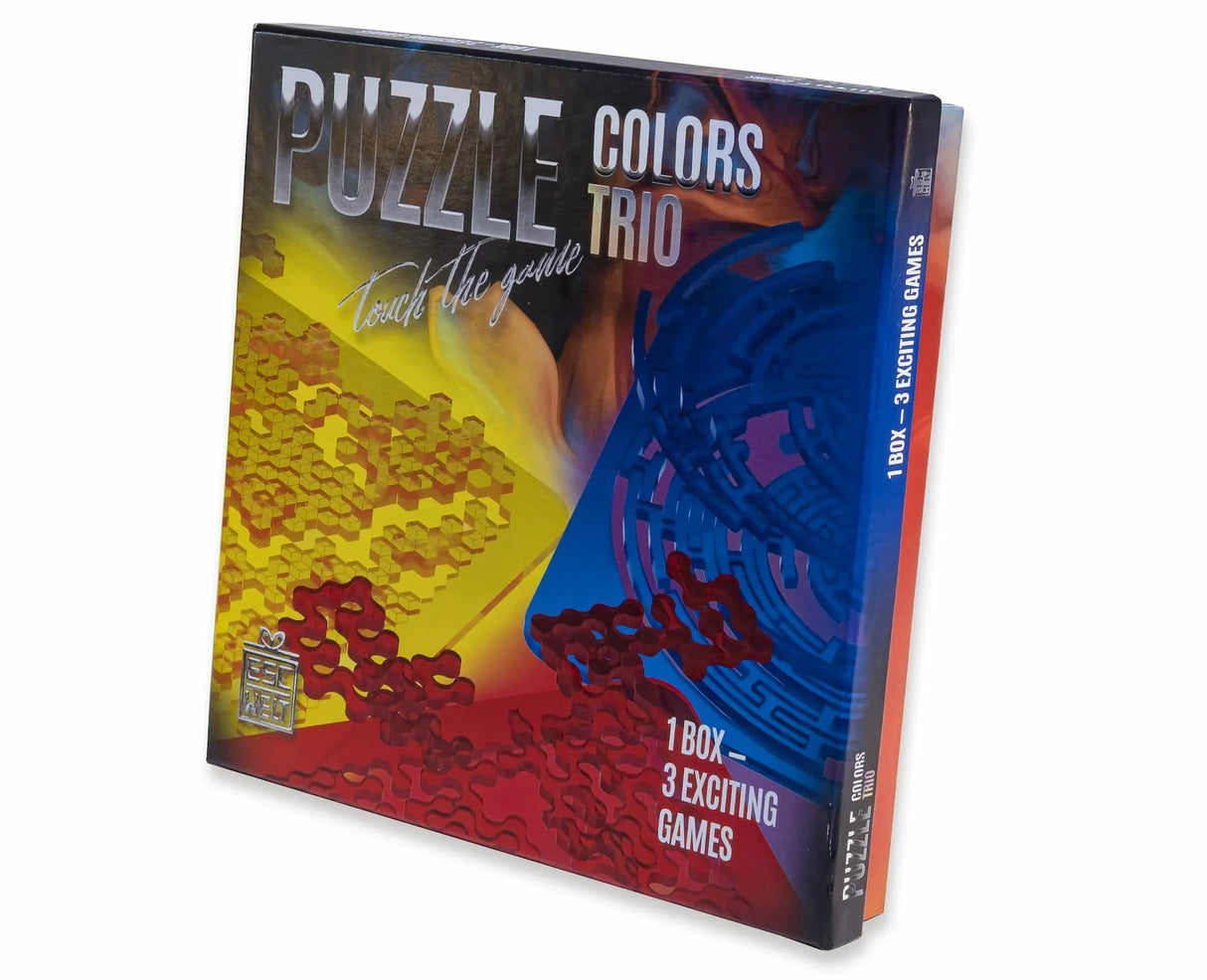 Produktverpackung des Puzzle Colors Trio von ESC WELT mit der Aufschrift 1 Box - 3 Exciting Games und Touch the game.
