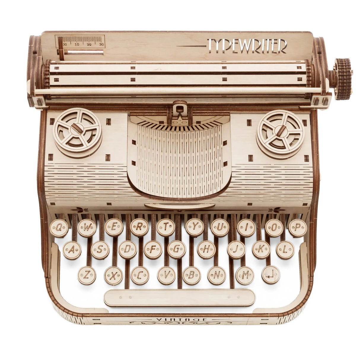 Holzmodell einer Schreibmaschine mit dem Wort TYPEWRITER oben eingraviert
