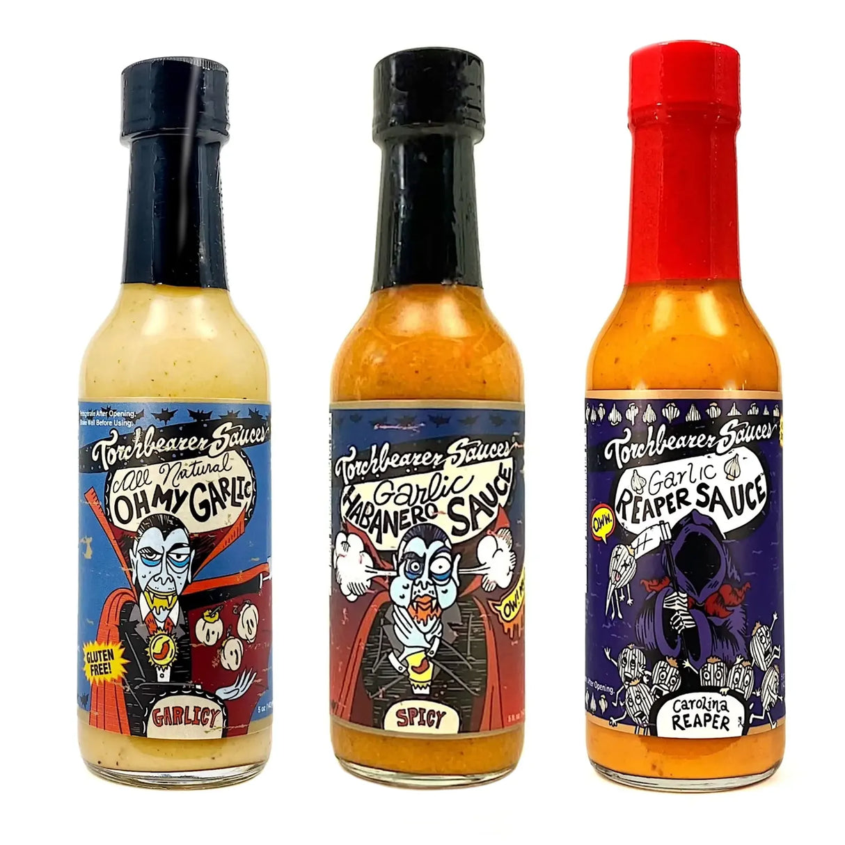 Drei Flaschen Torchbearer Saucen: Knoblauch, Habanero und Carolina Reaper