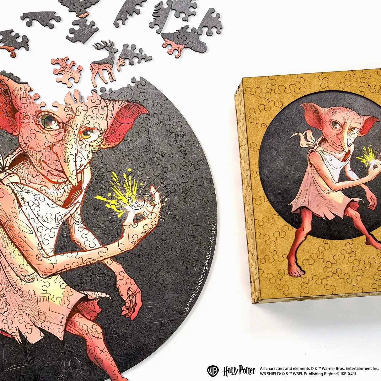 Dobby Puzzle mit Schachtel und verstreuten Teilen