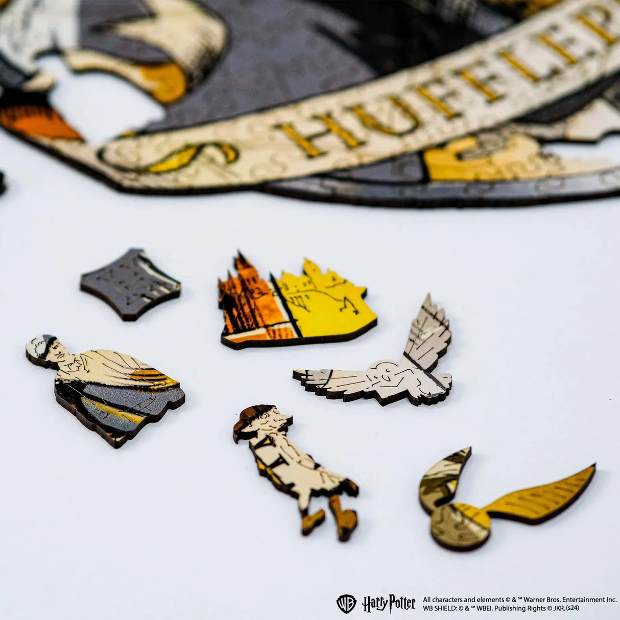 Harry Potter Puzzle mit Hogwarts, Hedwig, Hermine und einem Schnatz