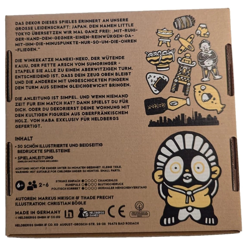 Rückseite der Verpackung des Helderbergs-Spiels mit japanischen Motiven und Spielanleitung