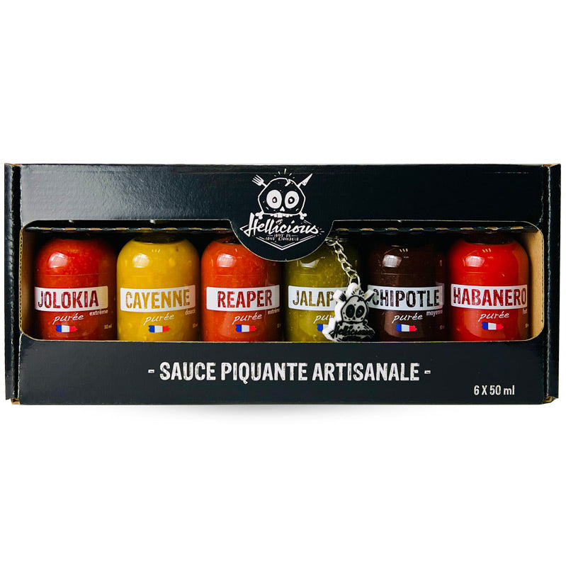 Sechs Flaschen Hellicious scharfe Sauce in einer schwarzen Geschenkbox