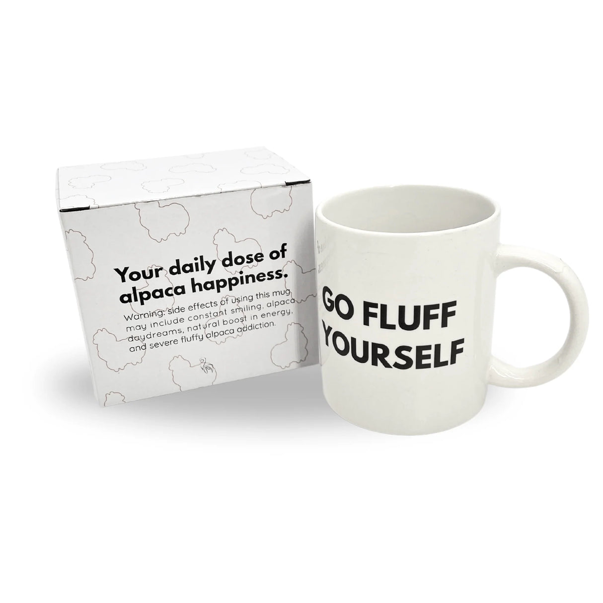 Weisse Keramiktasse mit Aufschrift Go Fluff Yourself neben passender Geschenkverpackung mit Alpakadruck