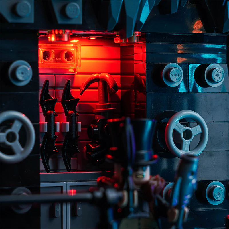 Lego Batman Ausruestung an einer Wand mit roter Beleuchtung