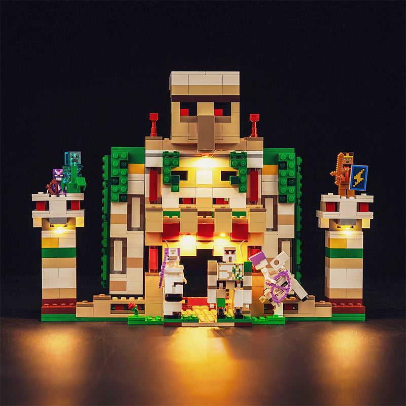 Beleuchtetes Lego Minecraft Set mit Eisen-Golem und Spielfiguren vor schwarzem Hintergrund