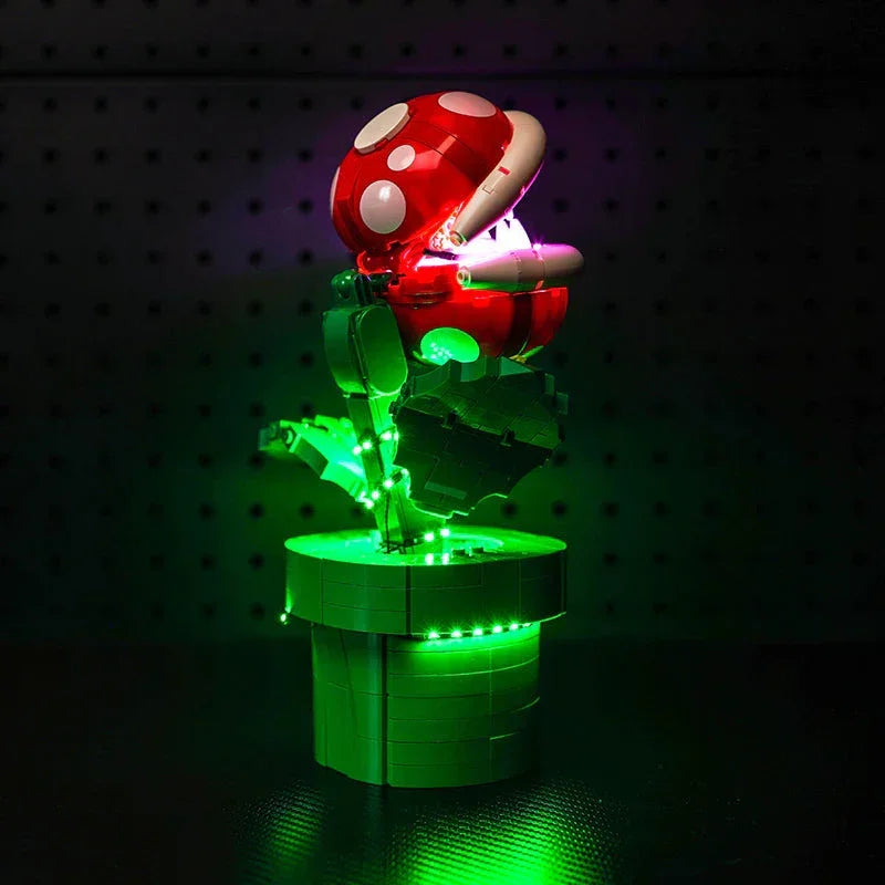 Beleuchtetes Lego Modell einer Piranha Pflanze in einem grünen Topf