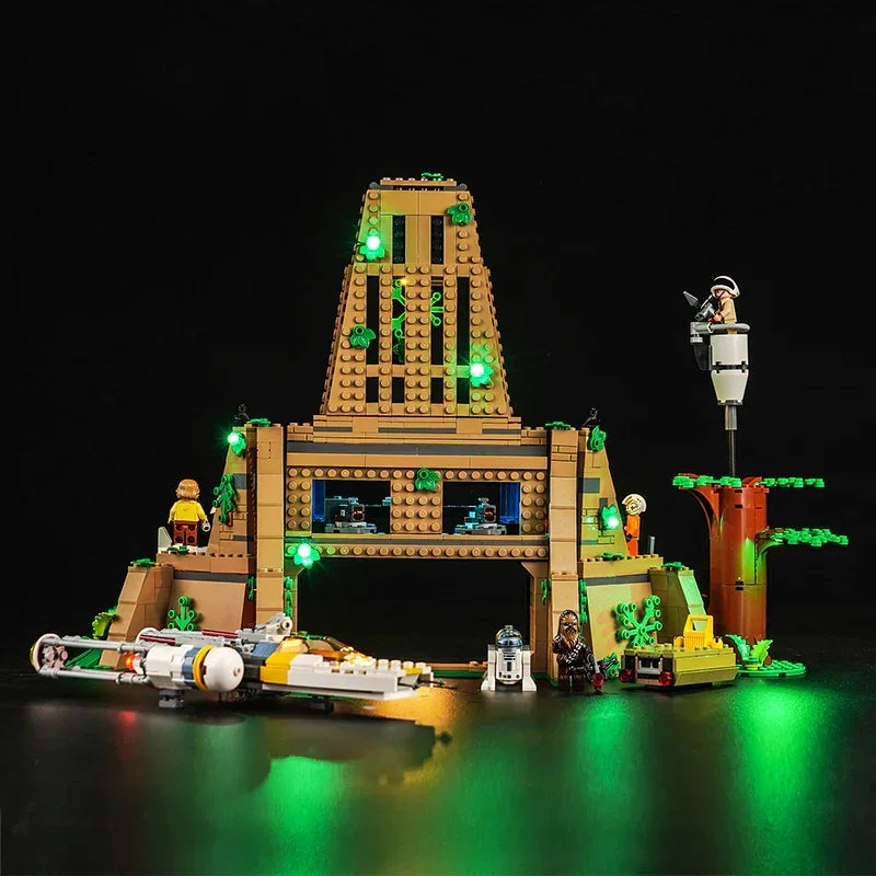 Beleuchtetes Lego Star Wars Set mit Y-Wing Sternenjäger und Minifiguren vor einem Tempelbauwerk