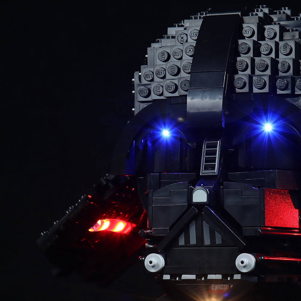 Darth Vader Helm aus Lego Steinen mit blauer und roter LED Beleuchtung vor schwarzem Hintergrund