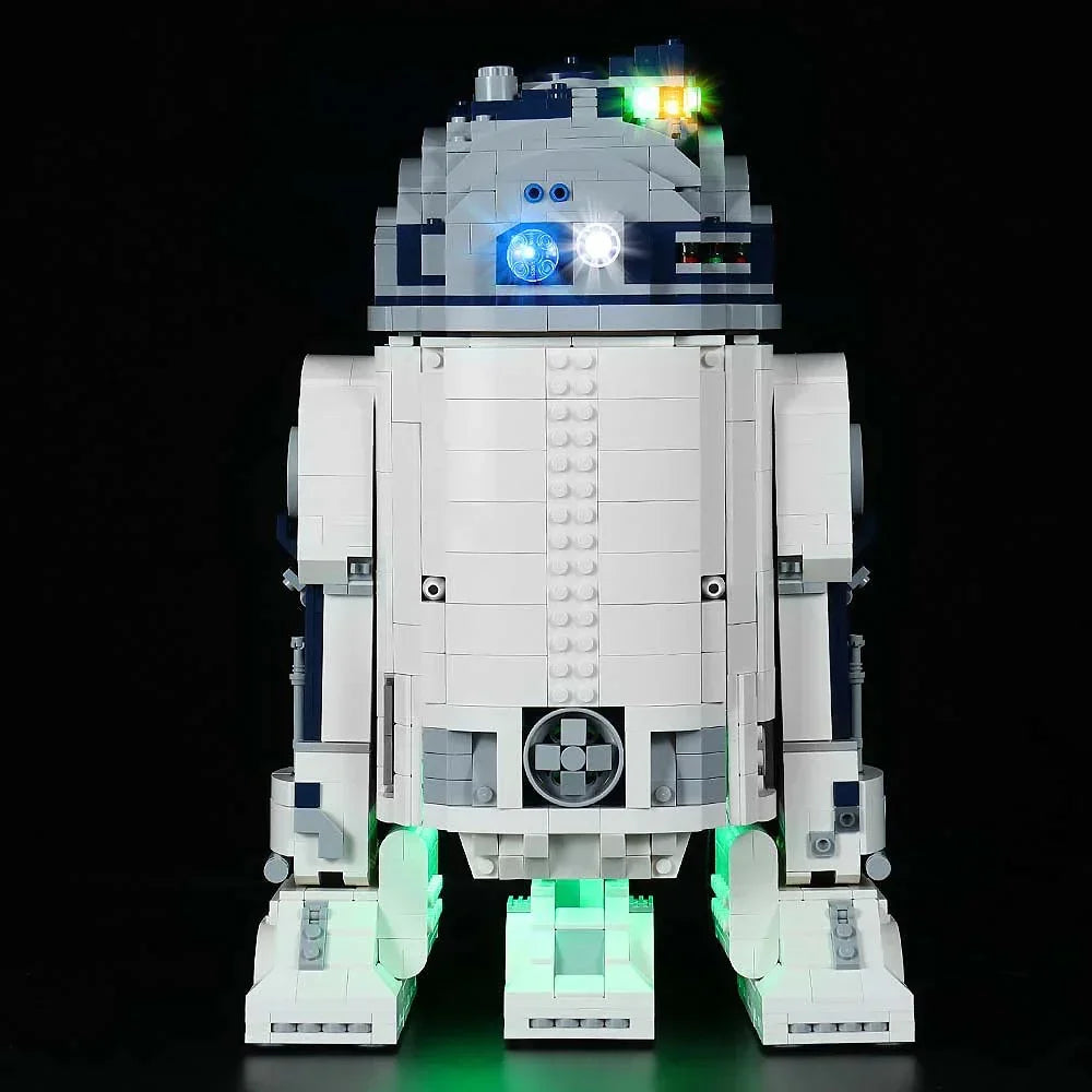 Beleuchtetes Lego Modell des Droiden R2-D2 vor schwarzem Hintergrund