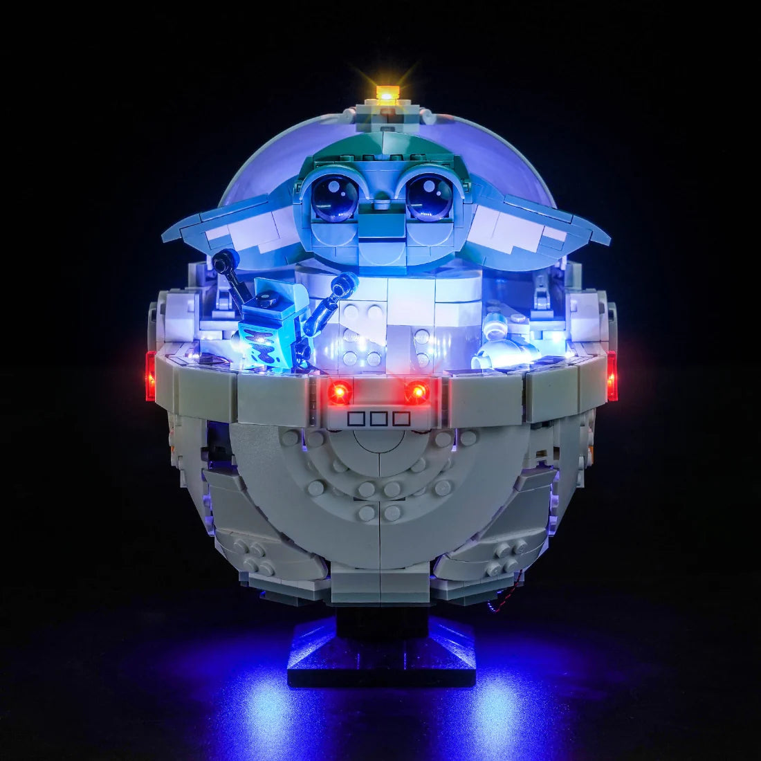 Beleuchtetes Lego-Modell von Grogu in seinem schwebenden Kinderwagen