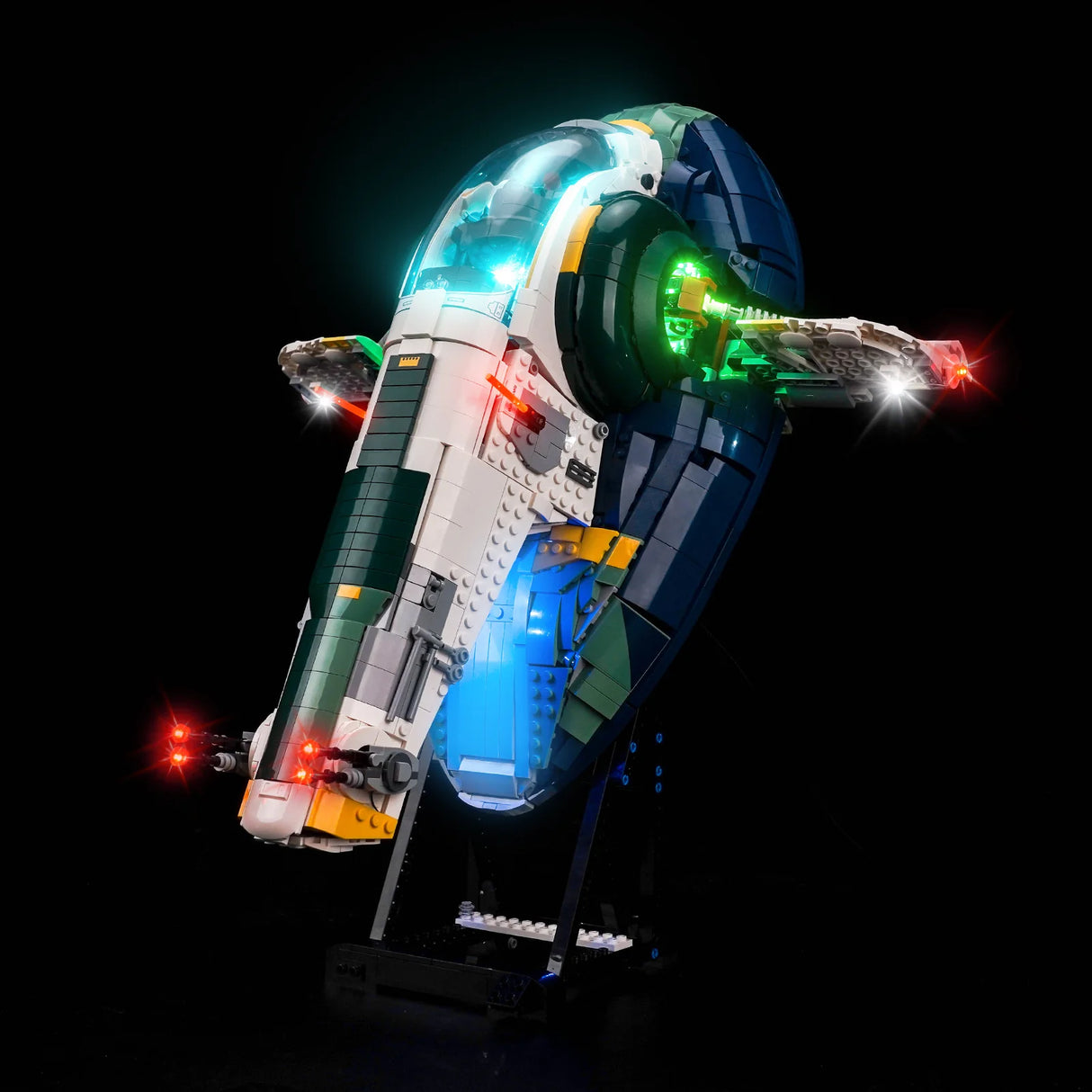 Star Wars Slave I Raumschiff mit grünen, roten und blauen Lichtern auf schwarzem Hintergrund