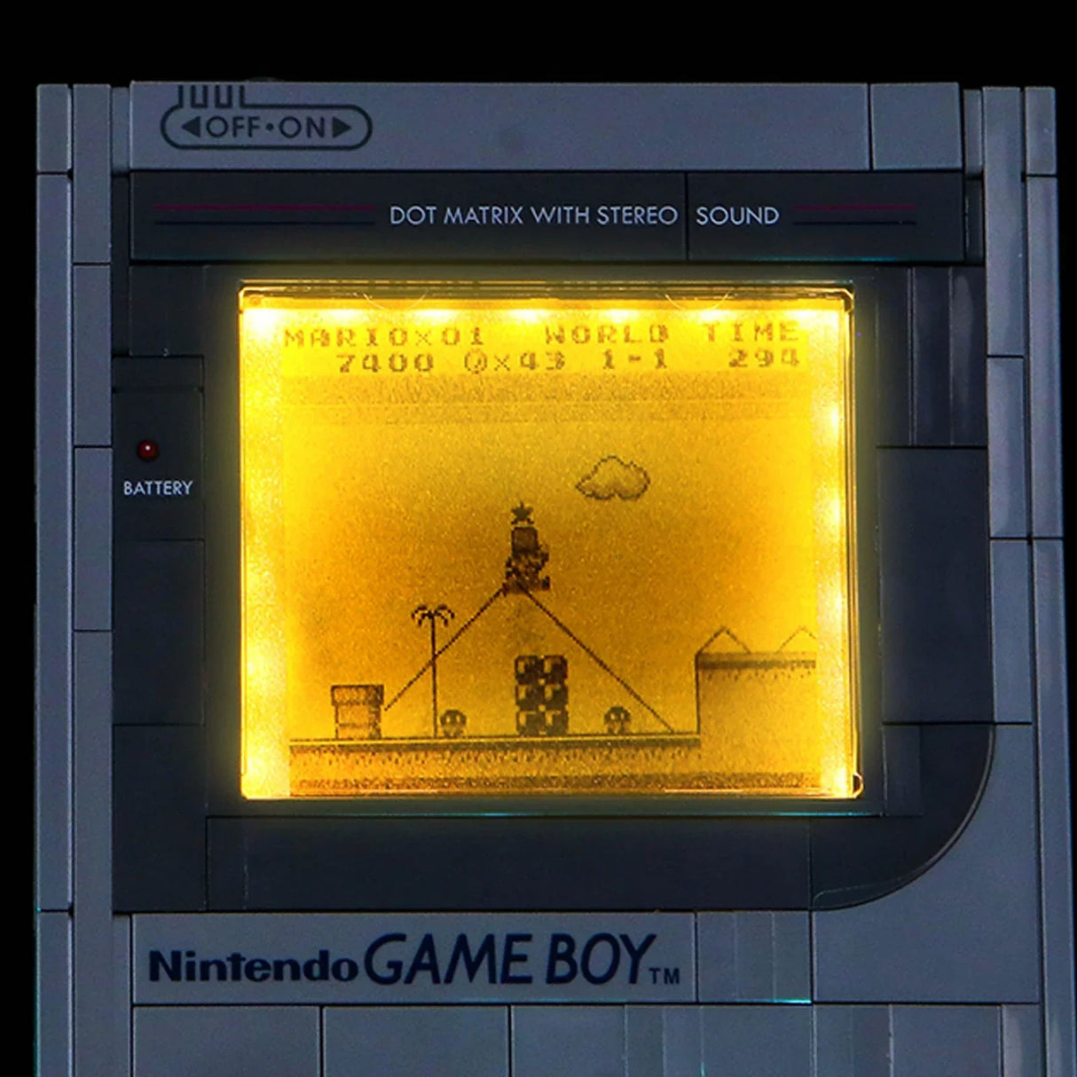 Nahaufnahme eines Nintendo Game Boy mit Super Mario Bros auf dem Bildschirm