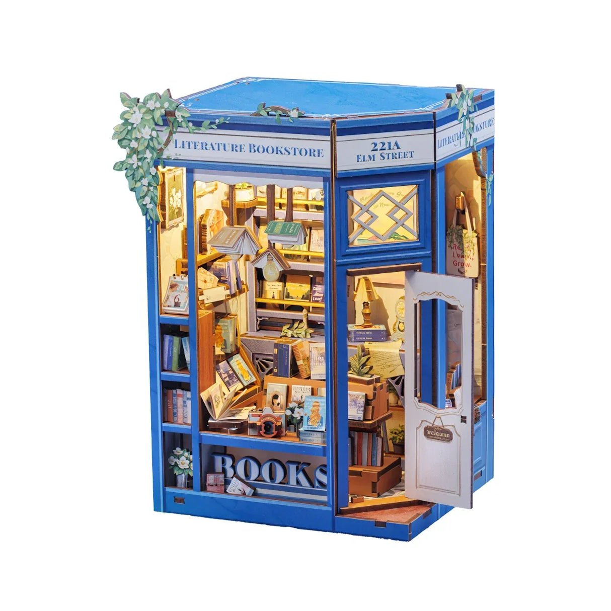 Miniatur-Bücherladen-Modellbausatz mit blauer Fassade und beleuchtetem Inneren