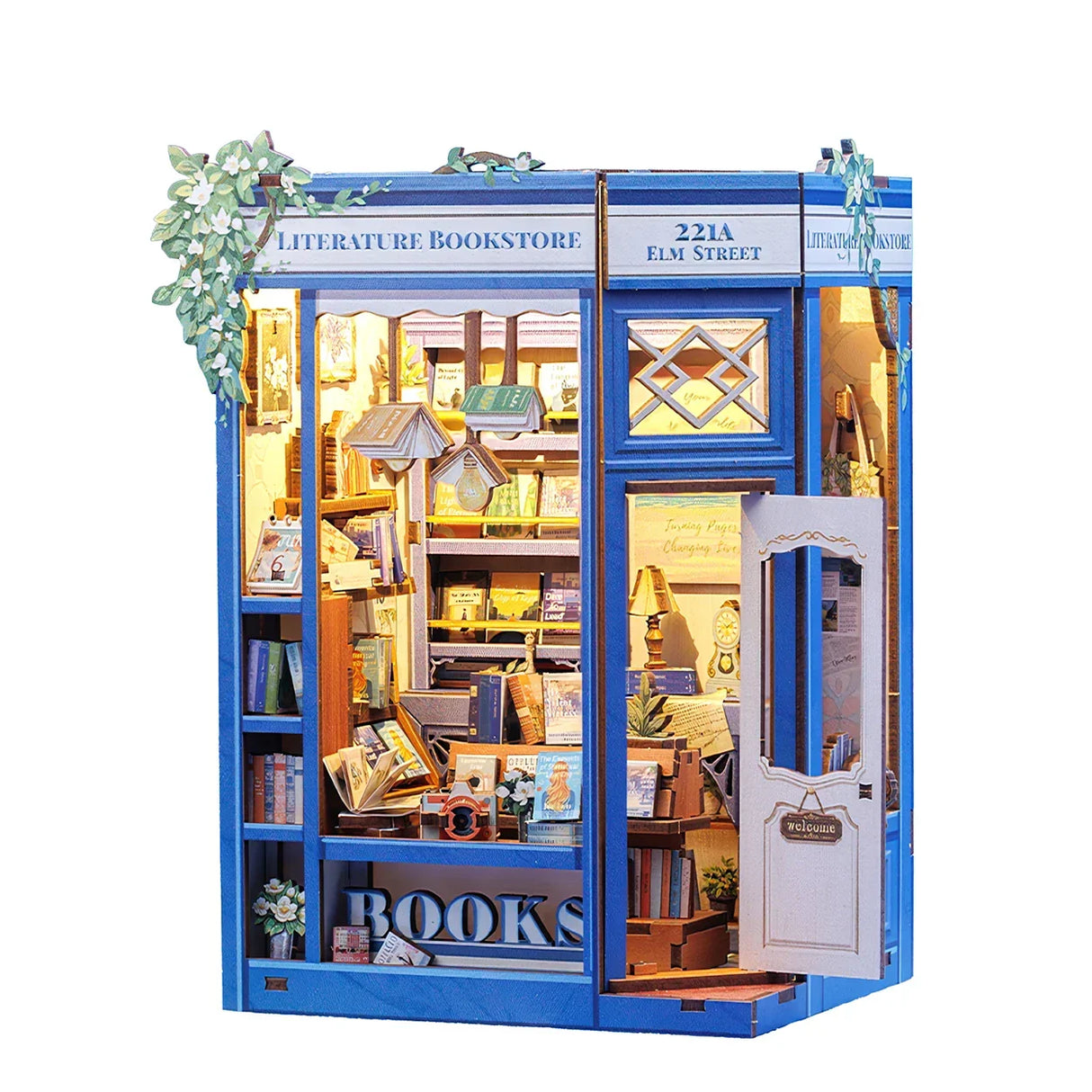 Miniatur-Buchhandlung mit blauer Fassade und vielen Büchern, beleuchtet