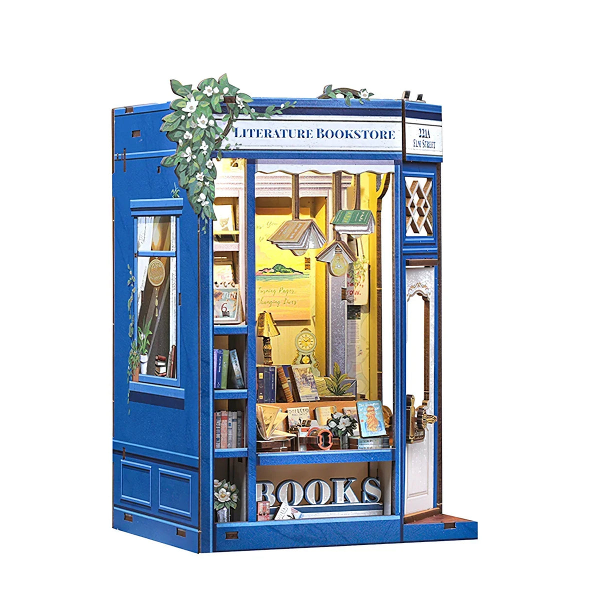 Miniatur-Buchhandlung mit blauer Fassade, Schaufenster und der Aufschrift „LITERATURE BOOKSTORE“
