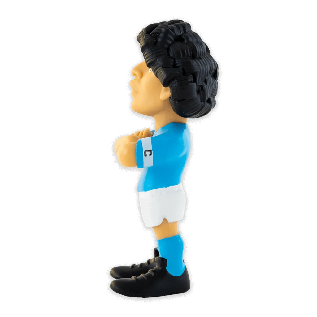 Figur eines Fussballspielers mit blauen Trikot und weissen Shorts