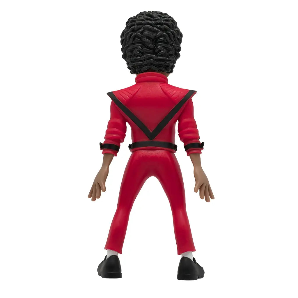 Rückansicht einer Michael Jackson Figur in rotem Anzug mit schwarzem V-förmigem Streifen und schwarzem Gürtel