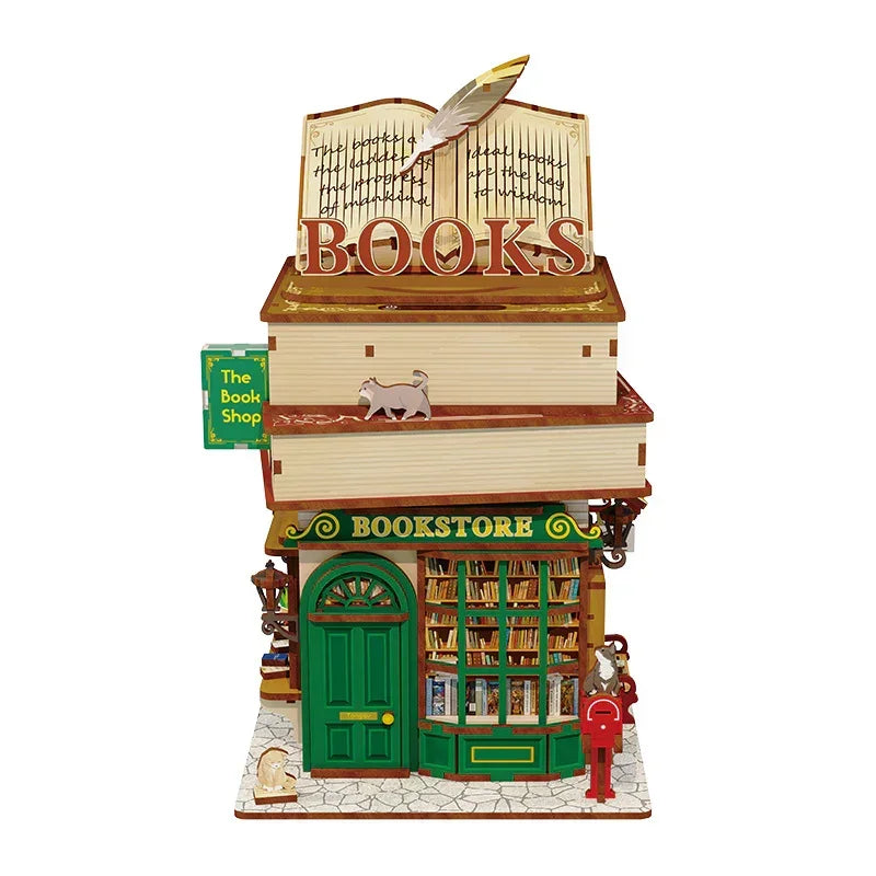 Miniatur-Buchladen-Modell mit grüner Tür, Schaufenster, Bücherstapeln und einer Katze