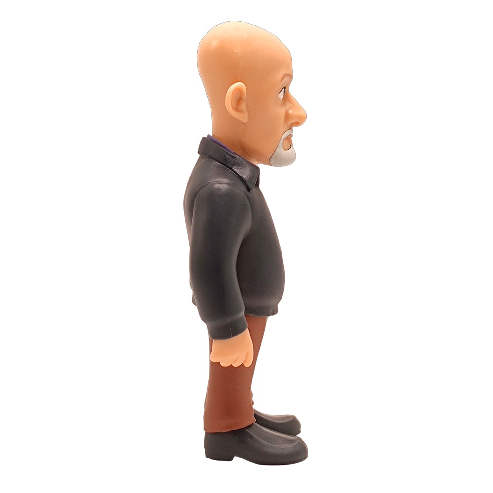 Figur eines Mannes mit Glatze und Bart in schwarzem Hemd und brauner Hose