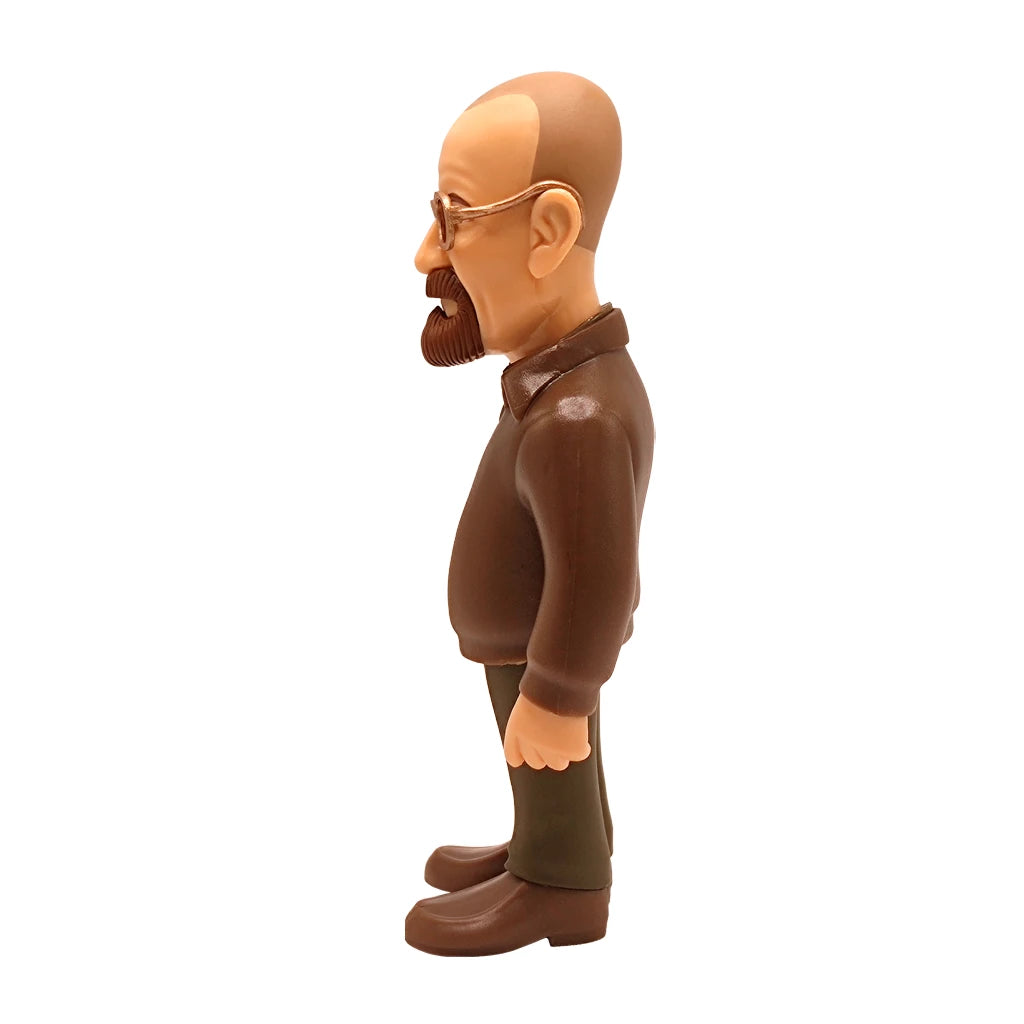 Figur eines Mannes mit Bart und Brille in braunem Hemd und grüner Hose