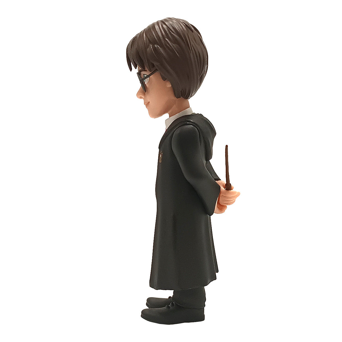 Harry Potter Figur mit Zauberstab hinter dem Rücken