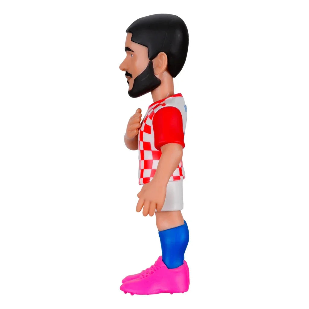 Fußballspieler-Figur mit Bart, kariertem Trikot, blauen Socken und pinken Schuhen