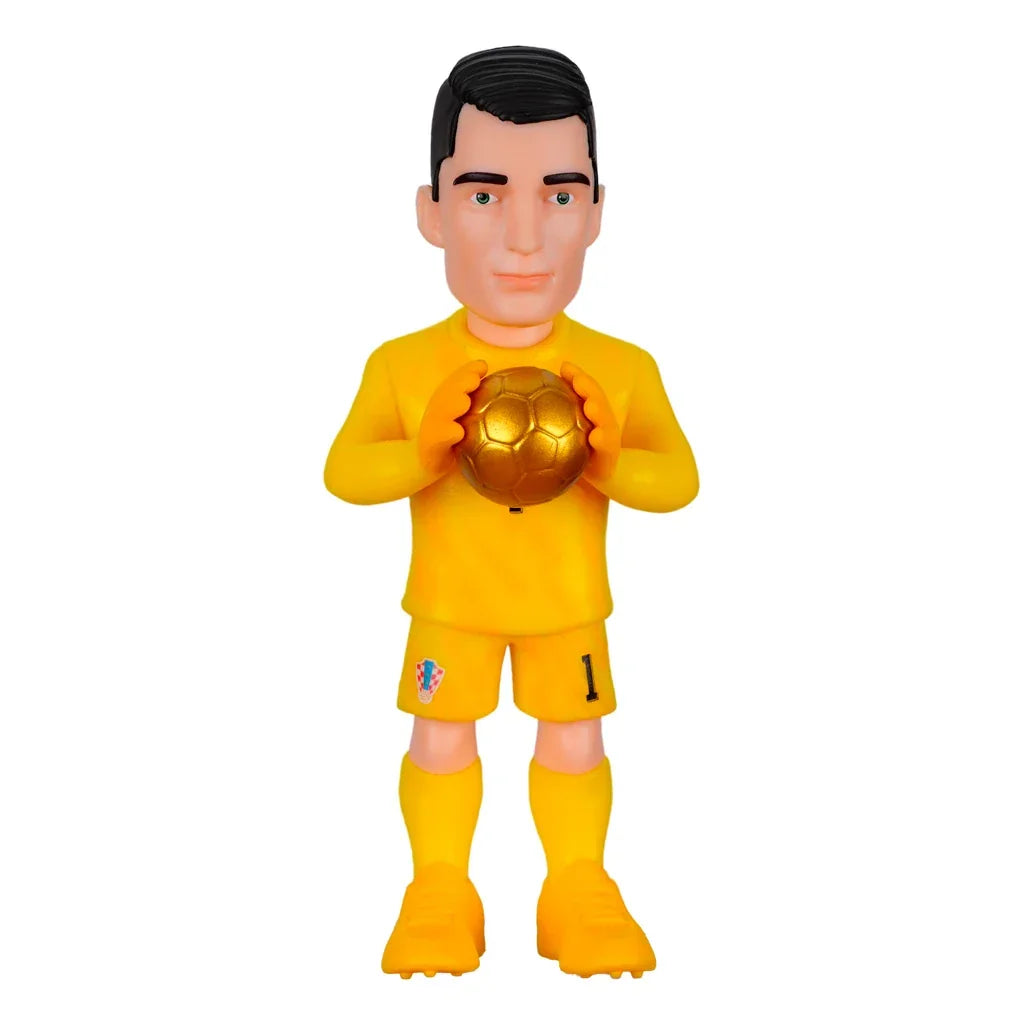 Fußballtorwart-Figur in gelber Uniform mit goldenem Ball